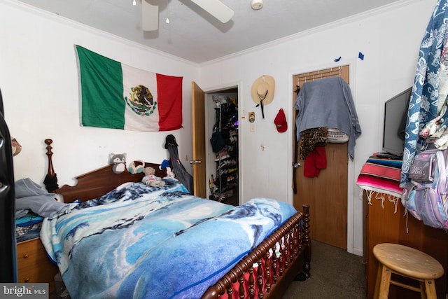 carpeted bedroom featuring ceiling fan and crown molding