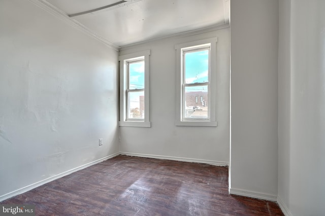 235 N Luzerne Ave N, Baltimore, MD 21224 - empty room with wood finished floors, ornamental molding, and baseboards