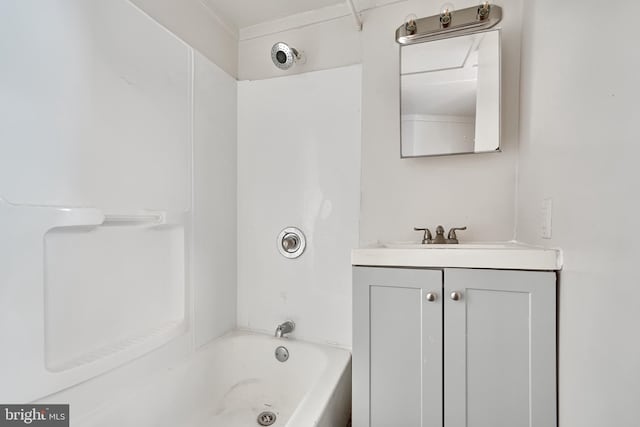 bathroom with bathtub / shower combination and vanity