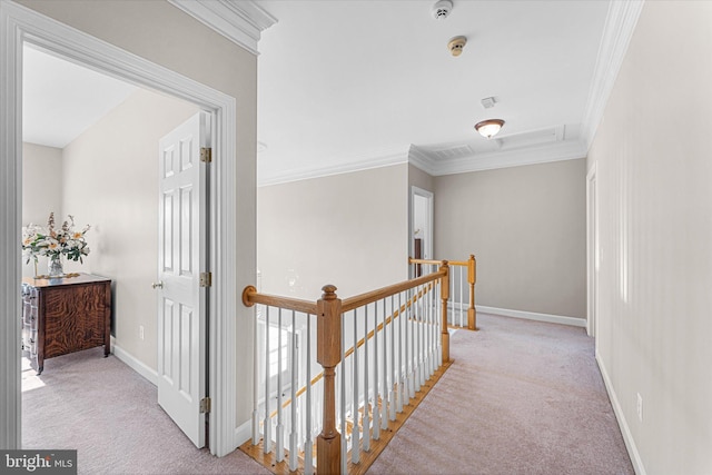 corridor with light colored carpet and ornamental molding