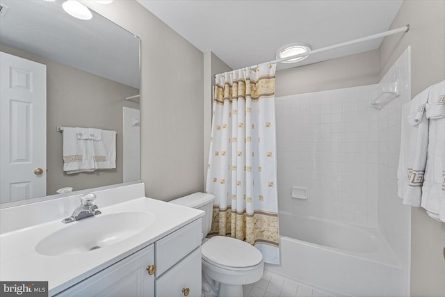 full bathroom with shower / bath combination with curtain, vanity, and toilet