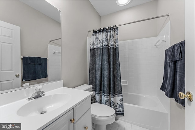 full bathroom with tile patterned flooring, vanity, shower / tub combo, and toilet