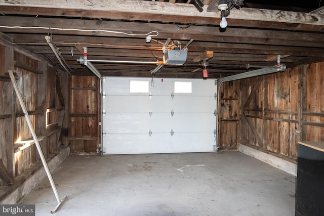 garage featuring a garage door opener