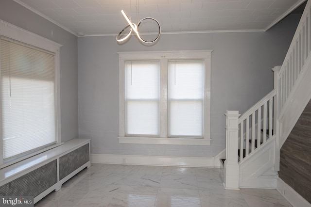 interior space featuring an inviting chandelier, radiator, and crown molding