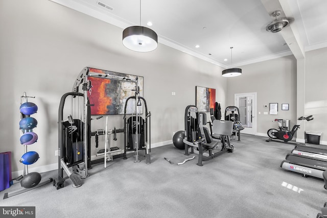 exercise room with crown molding