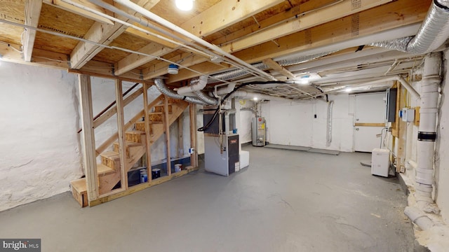 basement with heating unit and water heater