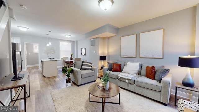 living room featuring light hardwood / wood-style floors