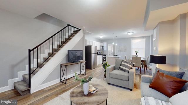 living room featuring light wood-type flooring