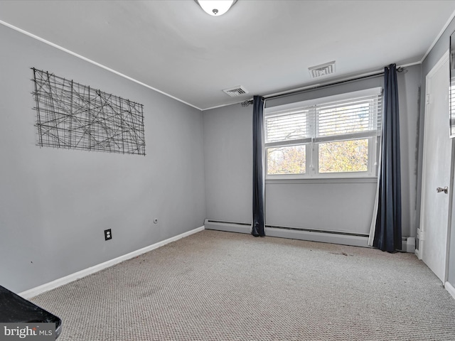 unfurnished room with carpet flooring and ornamental molding