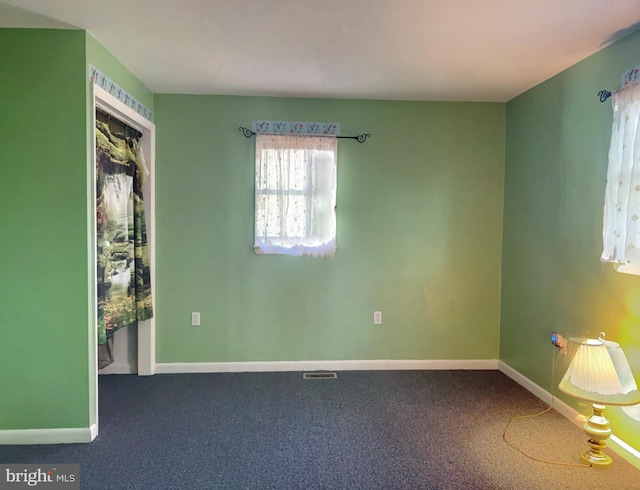 unfurnished bedroom with carpet