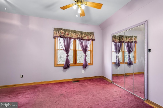 61 Belmont Ave, Wilmington, DE 19804 - unfurnished bedroom featuring carpet floors, a closet, baseboards, ceiling fan, and lofted ceiling