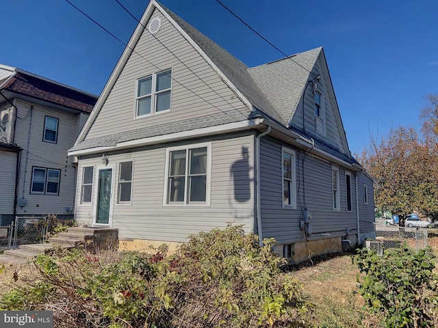 61 Belmont Ave, Wilmington, DE 19804 - rear view of property with a shingled roof and central air condition unit