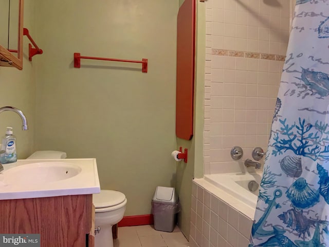 full bathroom with tile patterned floors, shower / tub combo with curtain, vanity, and toilet