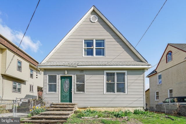 61 Belmont Ave, Wilmington, DE 19804 - view of front facade featuring entry steps, roof with shingles, and a gate