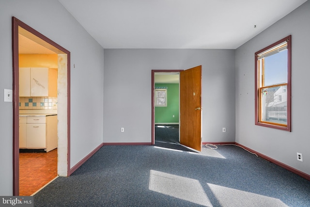 61 Belmont Ave, Wilmington, DE 19804 - carpeted empty room featuring baseboards