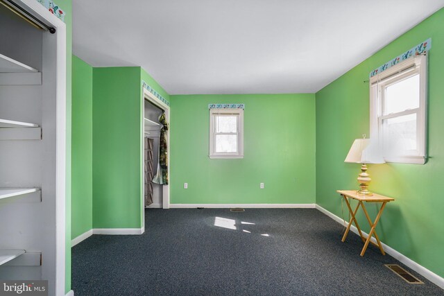 61 Belmont Ave, Wilmington, DE 19804 - unfurnished bedroom featuring baseboards and carpet