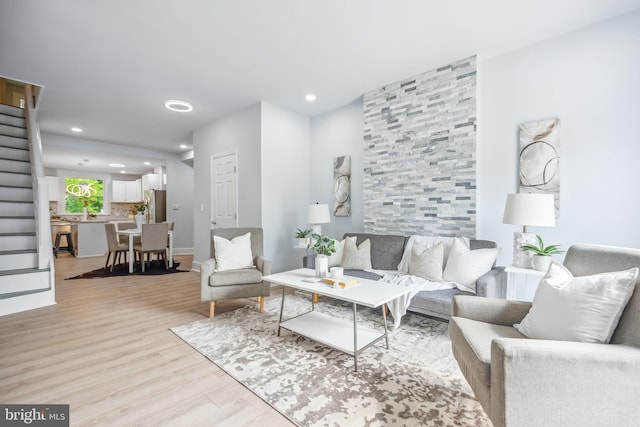 living room with light hardwood / wood-style floors