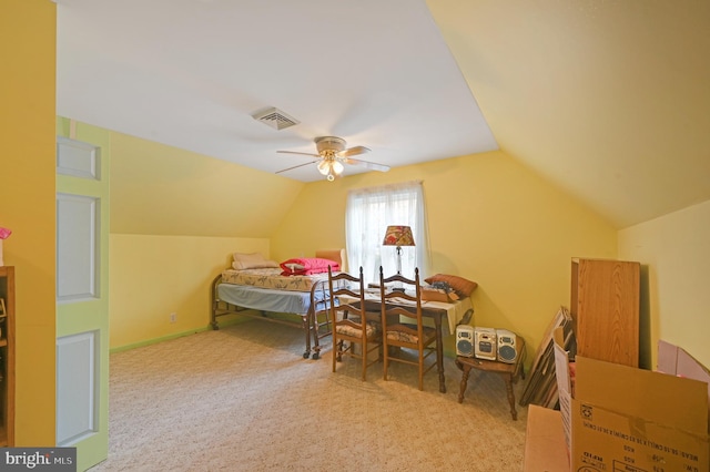 bedroom featuring ceiling fan, light carpet, and vaulted ceiling