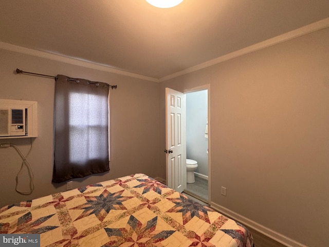 6406 Coastal Hwy Unit 201, Ocean City, MD 21842 - unfurnished bedroom with a wall mounted air conditioner, ensuite bathroom, crown molding, and baseboards