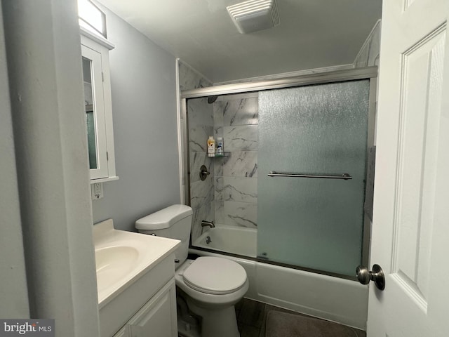6406 Coastal Hwy Unit 201, Ocean City, MD 21842 - bathroom with vanity, shower / bath combination with glass door, and toilet