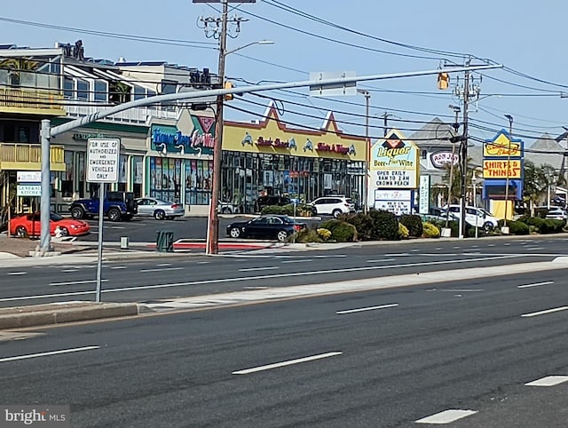 6406 Coastal Hwy Unit 201, Ocean City, MD 21842 - view of asphalt street featuring street lighting and curbs