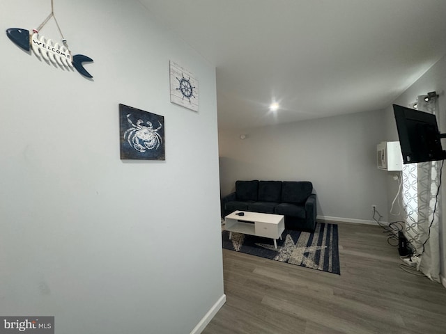 6406 Coastal Hwy Unit 201, Ocean City, MD 21842 - living area featuring wood finished floors and baseboards