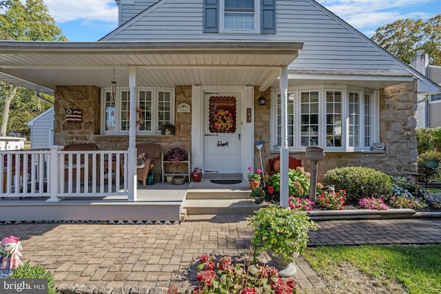 property entrance with a porch