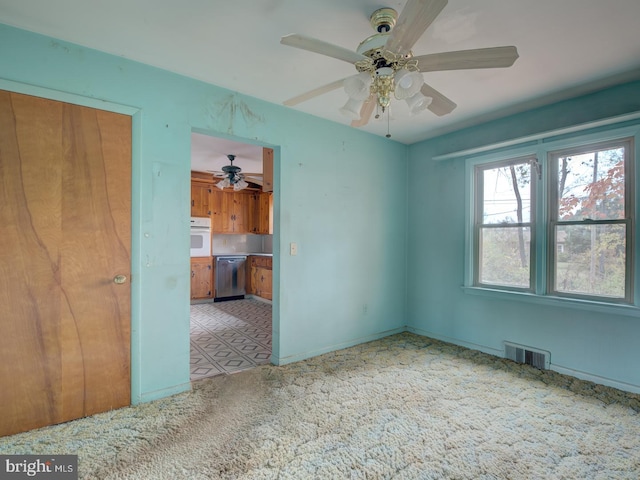 spare room featuring ceiling fan