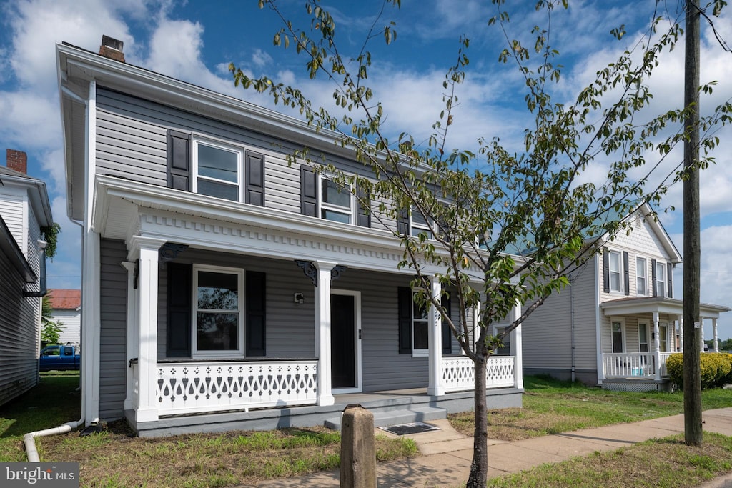 view of front of home featuring covered porch