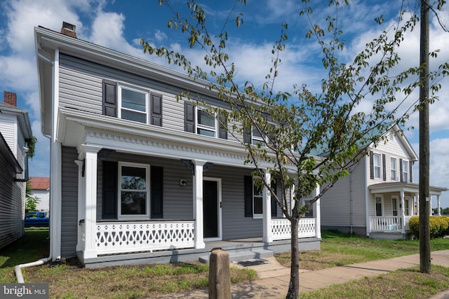 view of front of home featuring covered porch