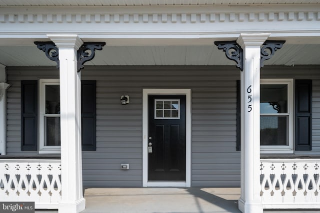 entrance to property with covered porch