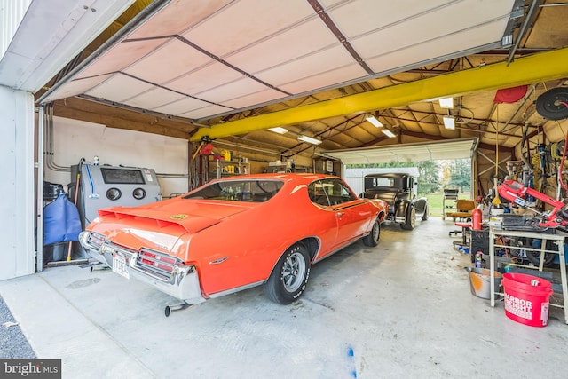 garage with a workshop area