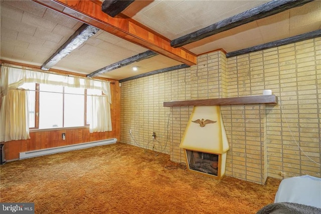 unfurnished living room featuring carpet, baseboard heating, beamed ceiling, and brick wall