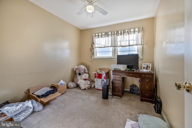 carpeted office with ceiling fan