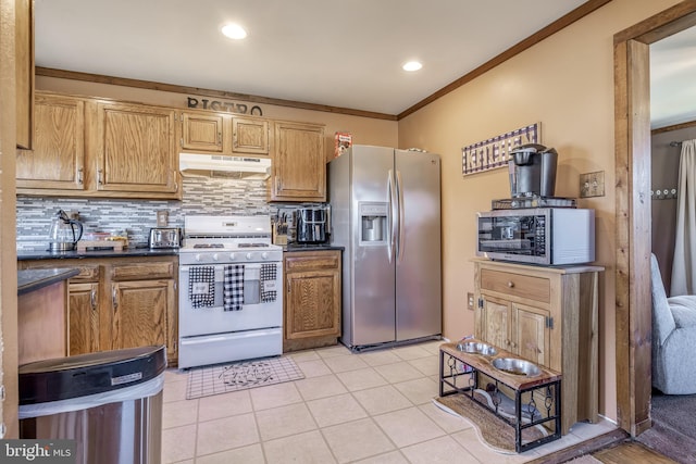 kitchen featuring ornamental molding, stainless steel appliances, light tile patterned floors, and tasteful backsplash