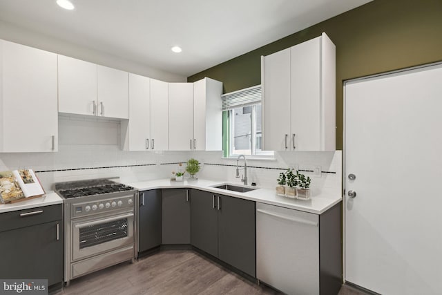 kitchen featuring sink, white cabinets, and stainless steel appliances