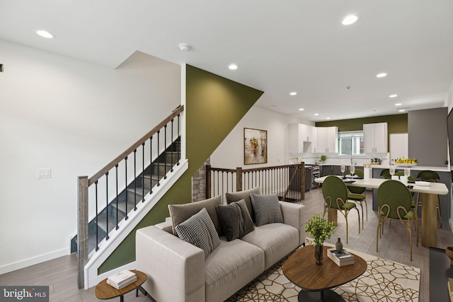 living room with light hardwood / wood-style flooring