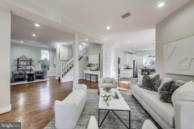 living room with dark hardwood / wood-style floors