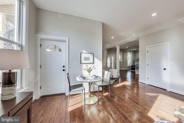 foyer entrance with dark hardwood / wood-style flooring