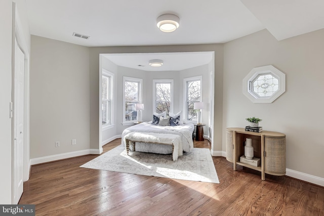 bedroom featuring dark hardwood / wood-style floors