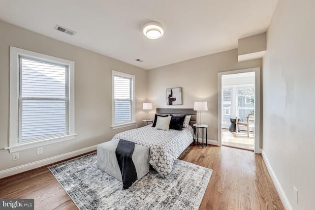 bedroom with light hardwood / wood-style flooring