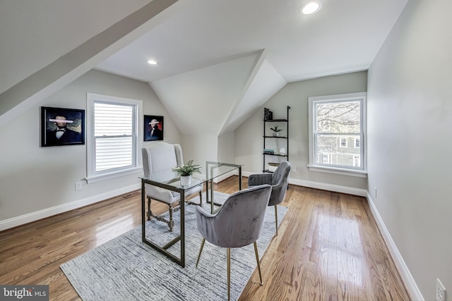 office featuring hardwood / wood-style flooring and vaulted ceiling