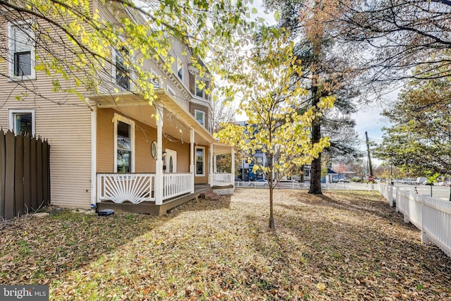 view of yard featuring a porch