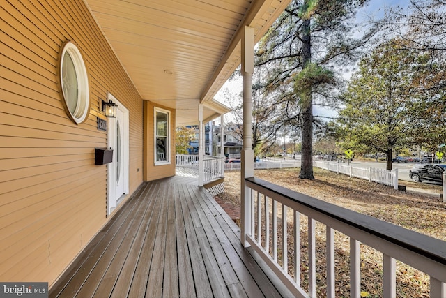 wooden deck featuring covered porch