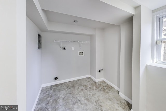 washroom with hookup for an electric dryer, washer hookup, and plenty of natural light