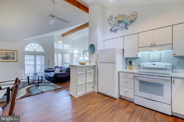 kitchen featuring beamed ceiling, white cabinetry, light wood-type flooring, and white appliances