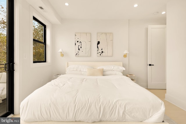 bedroom featuring light hardwood / wood-style flooring