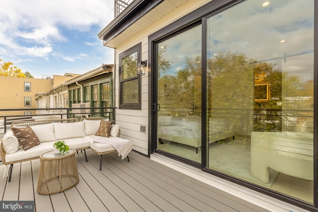 deck with an outdoor hangout area