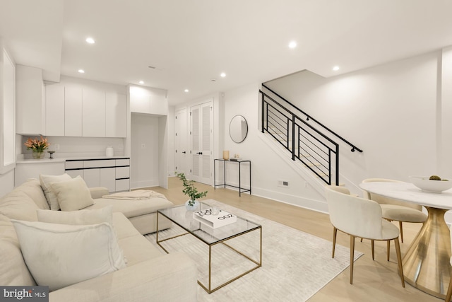 living room with light hardwood / wood-style floors