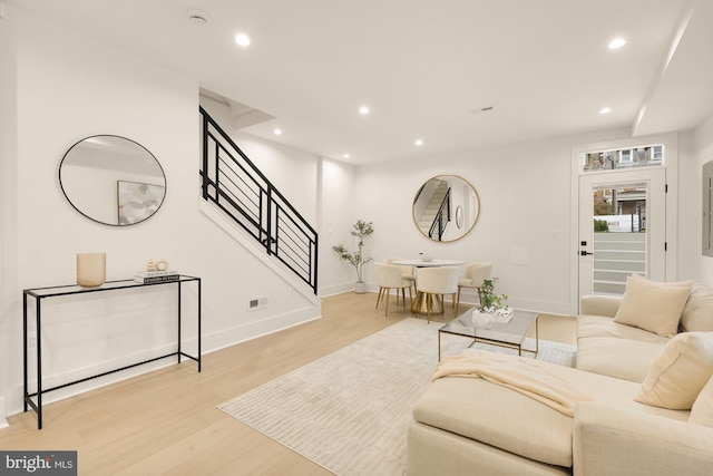 living room with light hardwood / wood-style floors